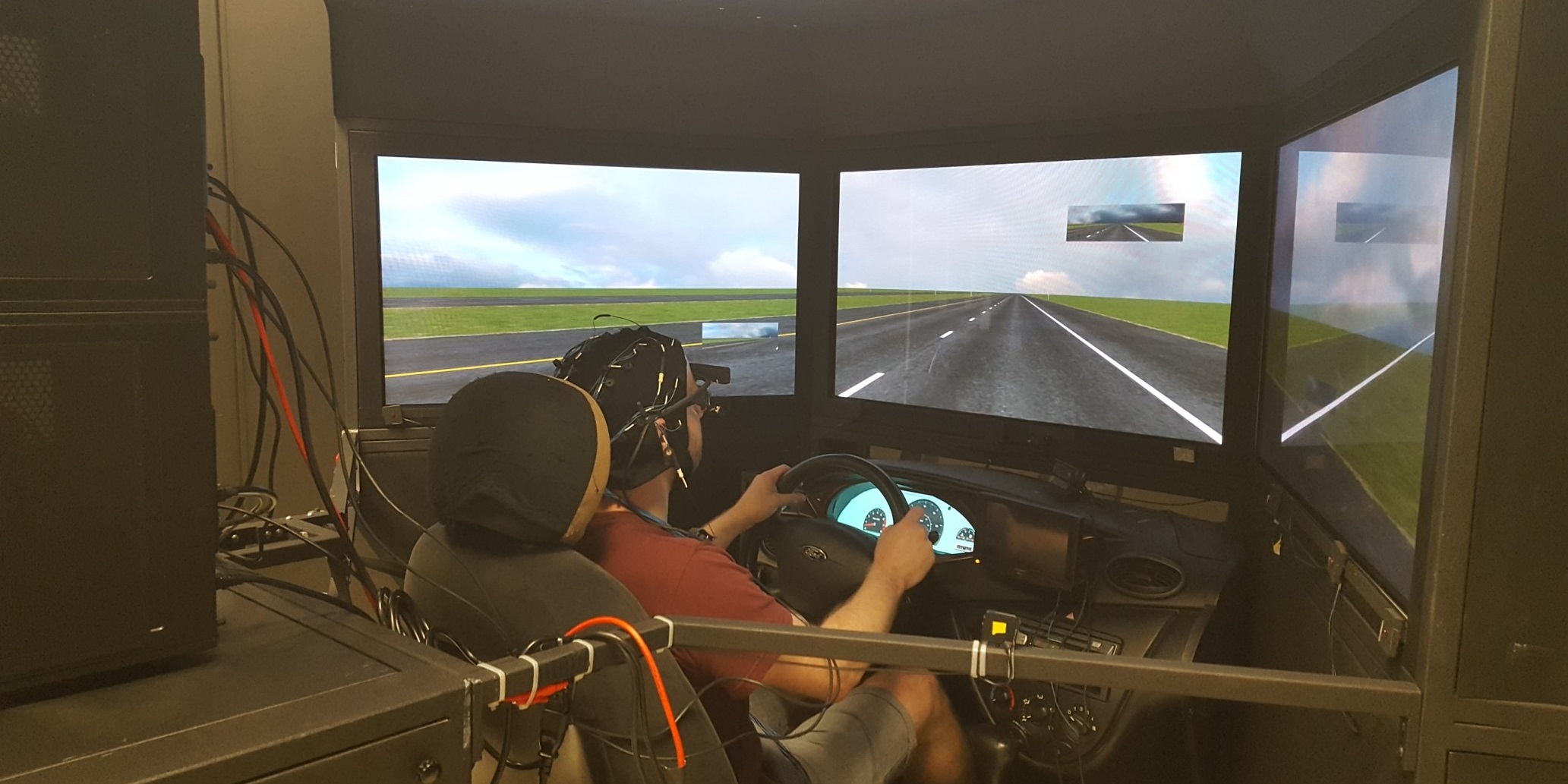 Driving simulator with experiment subject (NHTSA)